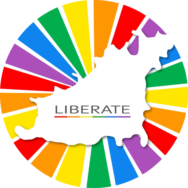 The logo for Liberate Guernsey with an outline of Guernsey and a rainbow background.